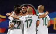 Algerian players celebrate.